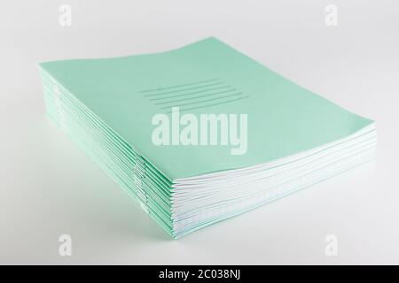 stack of thin student notebooks for elementary school Stock Photo