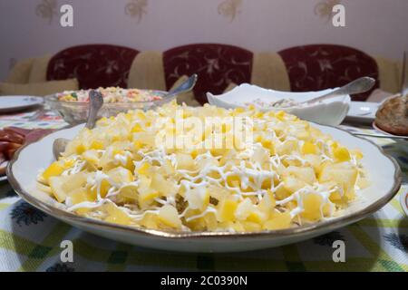 salad from a mixture of various products for a festive feast Stock Photo