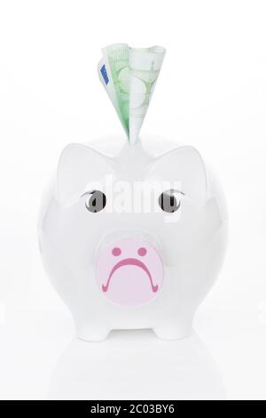 Sad piggy bank isolated on white background Stock Photo - Alamy
