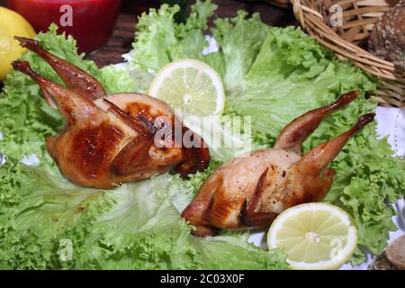 Has sung submitted with cowberry sauce and leaves of fresh salad Stock Photo