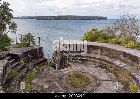 Former large artillery gun emplacements above the cliff line on Middle Head in Sydney Harbour with a direct line of sight to the harbour entrance Stock Photo