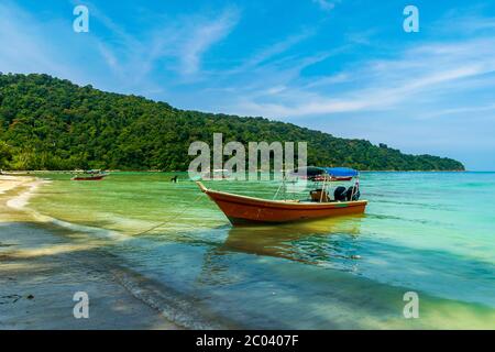 Teluk Dalam Beach, Besar, Perhentian Islands, Malaysia; May-2019; The boat and the sea Stock Photo