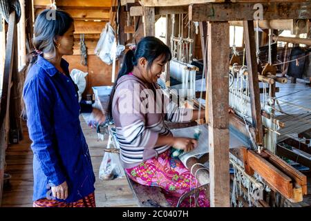 A Female Textile Worker Working In A Factory, Lake Inle, Myanmar. Stock Photo