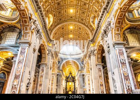 VATICAN CITY - MAY 07, 2019: Ray of light in interior of the Saint Peters Basilica, Vatican in Rome, Italy. Stock Photo