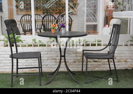 Table and chairs in a cafe Stock Photo