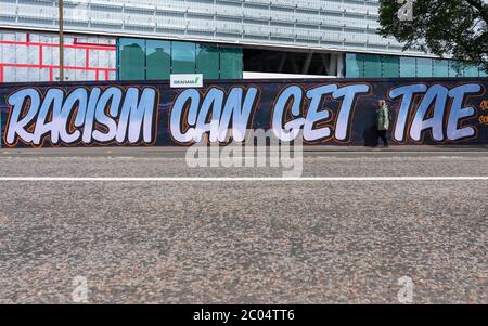 Edinburgh, Scotland, UK. 11 June 2020. Anti-racism graffiti has appeared on a street in Edinburgh. Iain Masterton/Alamy Live News Stock Photo