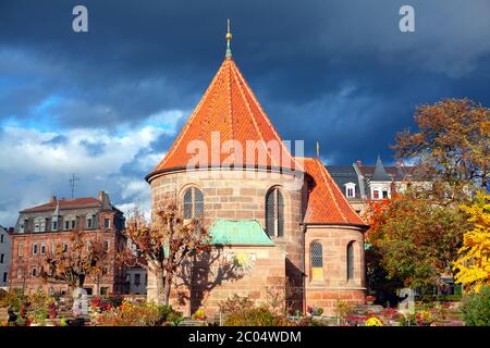 the church in the Nuremberg cemetery , Church St. Johannis in Nuremberg Germany , graveyard in the autumn Stock Photo