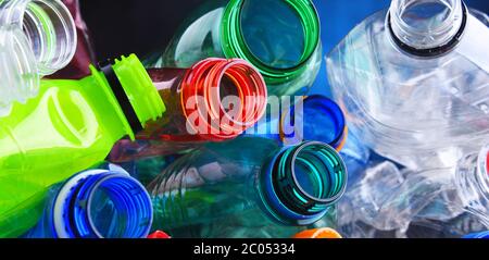 Empty colored carbonated drink bottles. Plastic waste Stock Photo