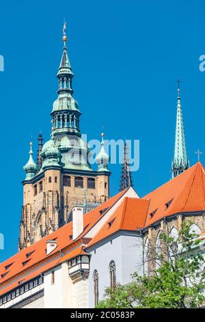 View of Saint Thomas Church main bell tower at blue sky background, Prague, Czech Republic Stock Photo