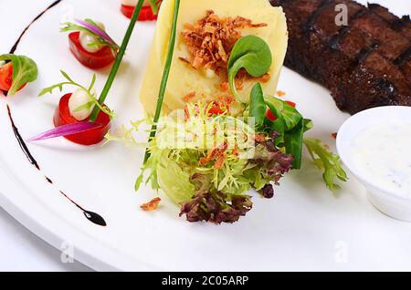 Liver with mashed potatoes and spinach Stock Photo