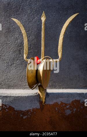 Trident also called Trishul at a hindu temple in kathmandu Nepal. Trident is also a Symbol of God Siva.Selective focus Stock Photo