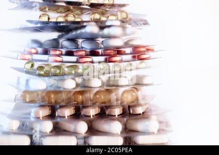 Concept of healthcare, medicine, pharmacy, drugs. Assortment of medicinal pharmaceutical products, tablets, pills, capsules in blister packaging. Stock Photo