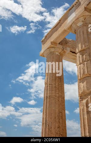 Athens Acropolis, Greece landmark. Ancient Greek Propylaea entrance gate part of building and pillars low angle view, blue sky, spring sunny day. Stock Photo