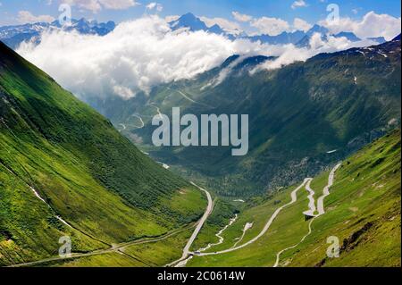 Pass road Furka pass, Grimsel pass in the background, Grimsel, Andermatt Canton Uri, Gletsch, Canton Valais, Switzerland Stock Photo