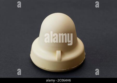 Cervical cap, mechanical means of contraception, birth control in woman Stock Photo