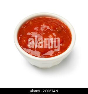 White bowl with red spicy mexican salsa isolated on white background Stock Photo