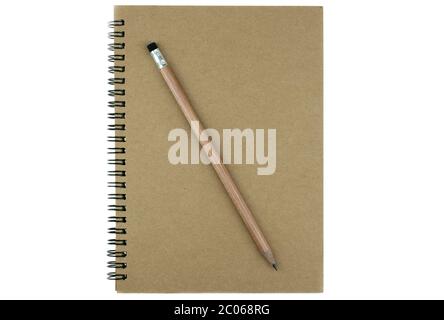 Pencil on top of book on the white background Stock Photo