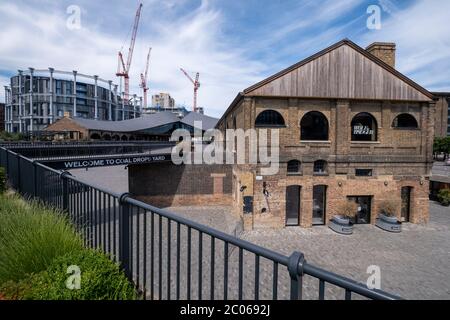 Coal Drops Yard, Kings Cross, recently redeveloped as a destination for boutiques, restaurants and bars formerly the coal yard for Kings Cross station Stock Photo