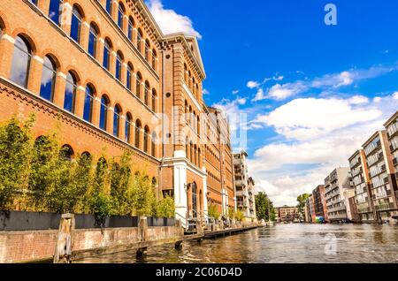 AMSTERDAM, HOLLAND – AUG. 31, 2019: Beautiful view of Amsterdam canals with bridge and typical dutch houses. Stock Photo