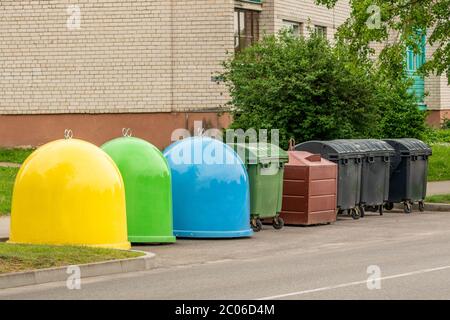 The different garbage bins on the street in residential area Stock Photo