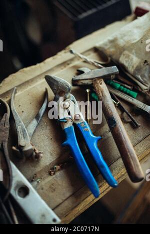 Old work tools in garage. Stock Photo