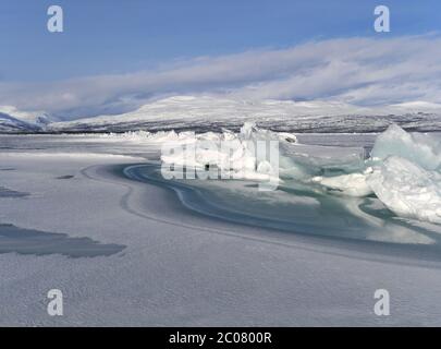 frozen lake Torneträsk in swedish lapland Stock Photo