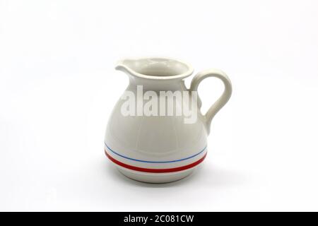 Milk pot, isolated on a white background Stock Photo