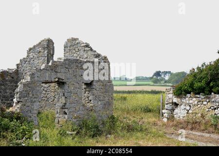 East Aberthaw is a quiet beach next to a huge power station, with derelict cottages and farmland Stock Photo