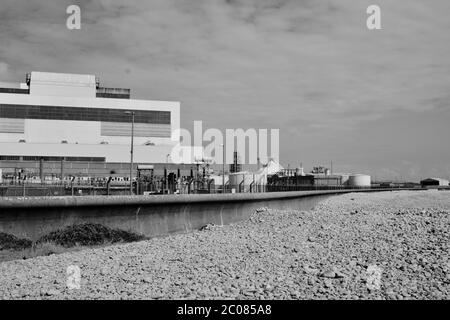 East Aberthaw is a quiet beach next to a huge power station, with derelict cottages and farmland Stock Photo