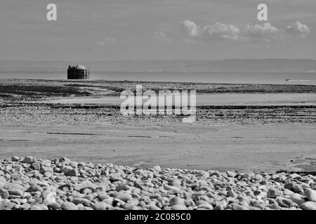 East Aberthaw is a quiet beach next to a huge power station, with derelict cottages and farmland Stock Photo