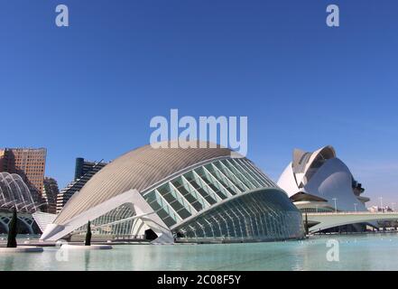 view of the Hemisferic and Palau de les arts reina sofia buildings at the City of Arts and Sciences on a sunny day Modern architecture Valencia Spain Stock Photo
