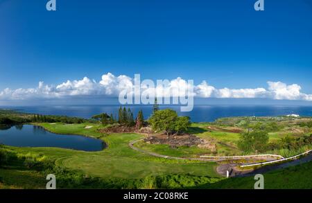 Panorama view from Kona Country Club Mountain Course (property released) with hole #14 and water hazard on left in Kailua-Kona, Hawaii Stock Photo