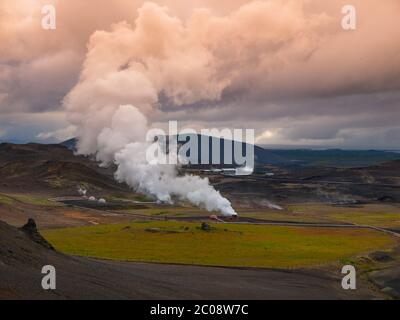 Icelandic landscape with plume of smoke from geothermal power station, Myvatn Lake, Iceland Stock Photo