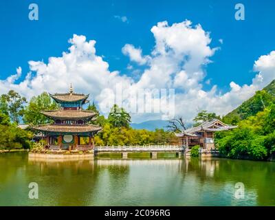 Black Dragon Pool and Moon Embracing Pavilion on sunny day, Lijiang, Yunnan Province, China. Stock Photo