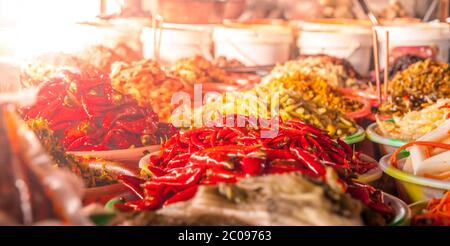 Dry red chili peppers in the oriental market. Stock Photo