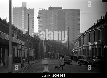 AJAXNETPHOTO. 27TH FEBRUARY, 1968. PORTSMOUTH, ENGLAND. - MONOLITHS RISING - VIEW ALONG BRADFORD ROAD; SOMERSTOWN TOWER BLOCKS DISTANT. TERRACED HOUSING ON RIGHT SINCE DEMOLISHED.PHOTO:JONATHAN EASTLAND/AJAX REF:3568134 2A 42 Stock Photo