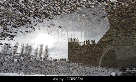 Fortress silhouette on water mirroring Stock Photo