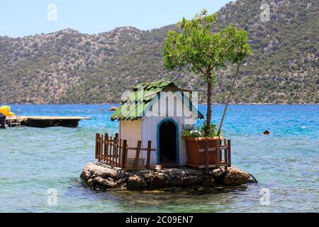 Duck house on the sea. This small shelter are made for ducks living in small village named Kalekoy / Mediterranean Sea. Stock Photo