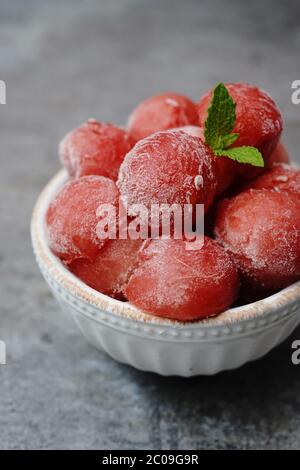 Frozen watermelon Balls in abowl, selective focus Stock Photo