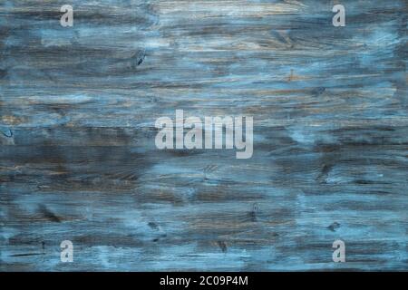 Blue stained wood texture background with a worn distressed effect. Use this weathered wooden textured material as design asset for a wall, floor boar Stock Photo