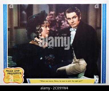 EDNA MAY OLIVER as Lady Catherine de Bourgh and LAURENCE OLIVIER as Mr. Darcy in PRIDE AND PREJUDICE 1940 director ROBERT Z. LEONARD novel Jane Austen screenplay Aldous Huxley and Jane Murfin Metro Goldwyn Mayer Stock Photo