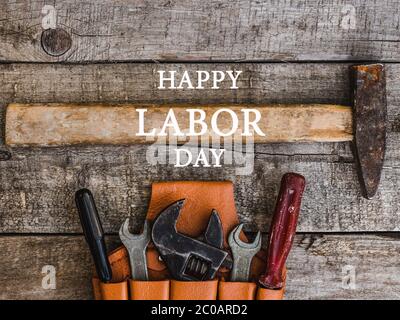 LABOR DAY. Hand tools lying on the table Stock Photo