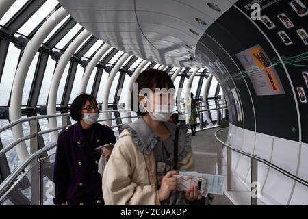 People at Tokyo Skytree Tower Observation Deck, also known as 'Tembo Gallery' starting at the 445th floor. Stock Photo