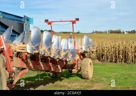 A plow or plough, to plow the fields before sowing. It is agricultural equipment and agricultural cycle. Stock Photo