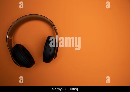 Wireless Headphones on clean solid colored Background Stock Photo