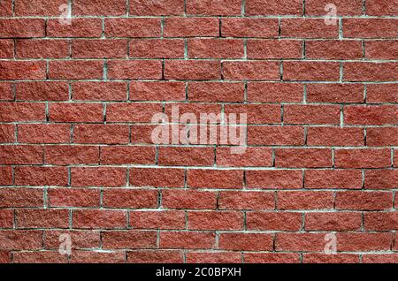 Wall from red brick close up Stock Photo