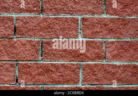 Wall from red brick close up Stock Photo