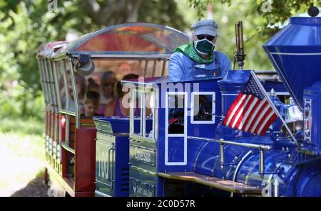 https://l450v.alamy.com/450v/2c0d57r/st-louis-united-states-11th-june-2020-an-engineer-on-the-zooline-railroad-wears-a-face-mask-as-he-drives-his-train-at-the-saint-louis-zoo-in-st-louis-on-thursday-june-11-2020-the-zoo-will-reopen-on-june-13-2020-with-employees-practicing-new-social-distancing-rules-with-special-members-today-photo-by-bill-greenblattupi-credit-upialamy-live-news-2c0d57r.jpg