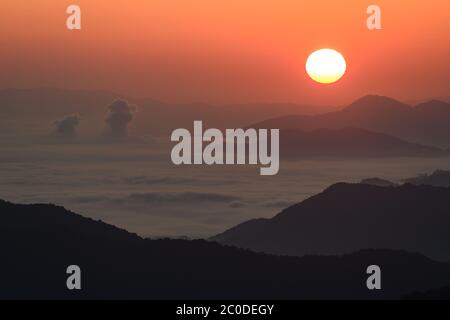 Sun Rises Over Cloudy Valley in Smoky mountains Stock Photo