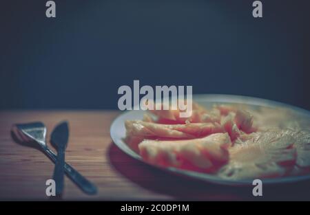 Slices Pineapple on wooden table Stock Photo